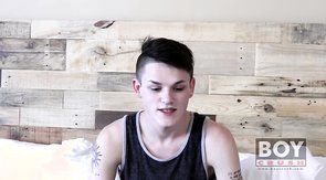 Black tank-top teen twink is fucking his asshole with big toys