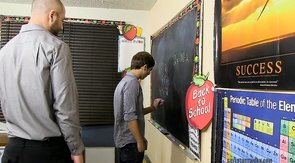 Schoolboy twink gets fucked from behind in the classroom