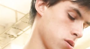 Red couch raciness with two dark-haired gay boys