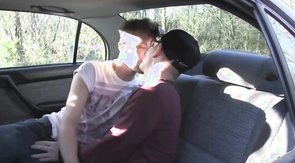 Sexy young men are getting on the backseat just to suck each other