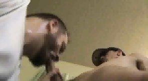 Beautiful bearded hunk is sucking a massive dick on the knees