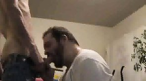 Brunette twink getting his cock sucked by a bearded bear