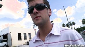 White dude in sunglasses is sucking this huge pole