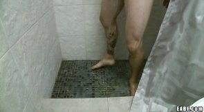 Mature hunk taking hot shower and wanking his wiener