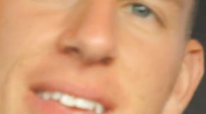 Horny gay with shiny smile looking attentively for straight