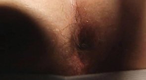 Muscled pal in white stripes shows off his hairy anal hole