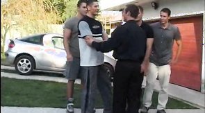 Two men are getting sucked outdoors by shared boyfriend