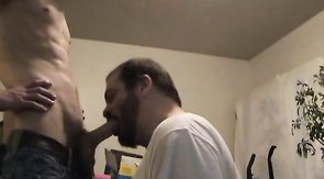 Bearded beard kneels down just to give a gorgeous blowjob