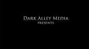 Dude in black snapback pounds his lusty mate in room full of belts