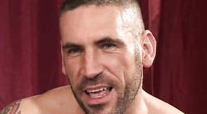 Tattooed white buddy sucks his first black dick down on the knees