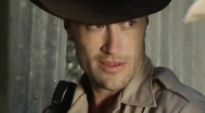 Two sexy sheriffs are getting nicely sucked by a horny newcomer