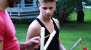 Perfect young man is jerking off his loaded dick on the poolside