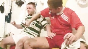 Bald mature male is sucking on the knees in the dressing room