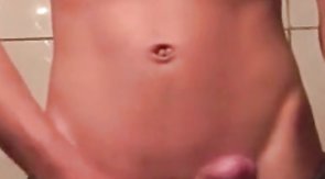 Twink boy plays with his toy