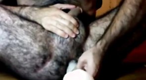 Hairy guy and his dildo