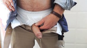 Mature Pissing on Toilet Office