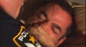 Sexy officer is taking bear's dick in the bedroom