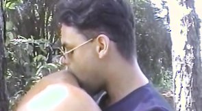 Muscled hunks kissing and posing outdoors in Hung BF video