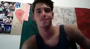 Seductive young mate is playing with his hard dick