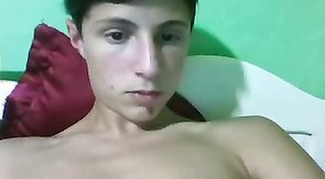 Innocent boy with impressive dick is wanking on cam