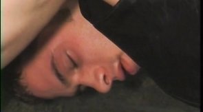 Hanged up jock is taking dick in his tight anal hole