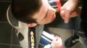 Biker gives blowjon to skin in toilets