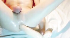 Slim Oiled Twink Puts A Giant Dildo Up His Ass