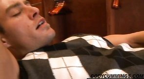 Inked boyfriend is lying and wanking his massive dick