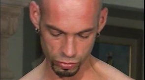 Impressive bald lover is blowing his friend's hard cock