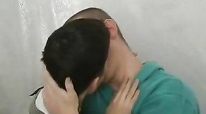 Clothed mate is trying to swallow his partner's dick