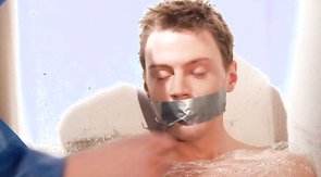 Submissive male is being humiliated and fucked in the mouth