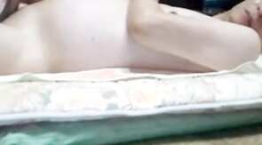 Asian grandpa jerking off on the bed