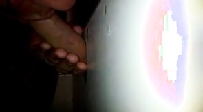 Glory hole cock sucking with cum swallow..