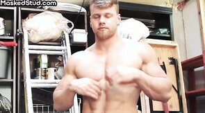 Amateur muscled stud wanks cock and cums in the stockro