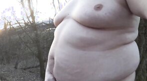 Chubby masturbates in the woods