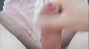 Boy jerking off uncut dick and cums