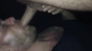 Sucking cum out of a tourist daddy in darkroom