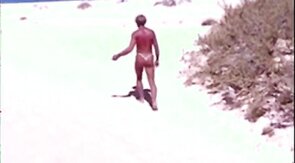 Tanned guy on beach in tiny string thong (temporarily!)