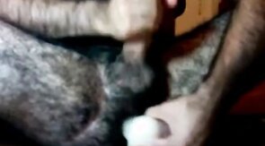 Hairy guy and his dildo