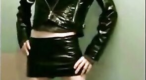 Sissy Sandracduk posing in leather outfit