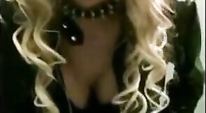 Sissy Sandracduk posing in leather outfit