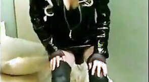 Sissy Sandracduk posing in leather outfit