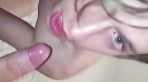 Smooth twink in pink chastity cage sucks weenie