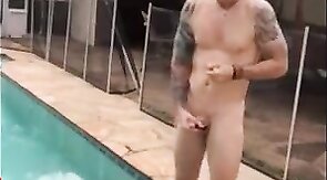 Married hunk jerks off over the pool while smoking