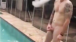 Married hunk jerks off over the pool while smoking