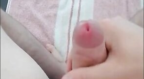 Boy jerking off uncut dick and cums