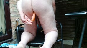 me playing naked in my garden with a carrot in my ass