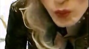 Sissy Sandracduk posing in leather outfit