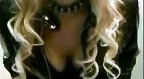 Sissy Sandracduk posing in leather outfit