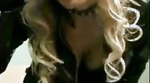 Sissy Sandracduk posing in leather outfit